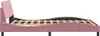 Side view of a pink bed frame with a headboard and wooden slats. Produktbild-Vorschau