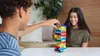 Mattel UNO grigio Stacko Jenga Block Game 43535 / 4 Anteprima dell’immagine prodotto 3