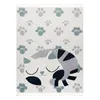 A rug with a sleeping cat design and paw prints. Podgląd zdjęcia produktu