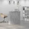 A reception desk in a modern office setting with a chair and shelving unit. Anteprima dell’immagine prodotto