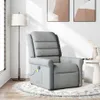 A gray fabric massage chair is shown in a room with a floor lamp and artwork on the wall. Náhľad obrázku produktu