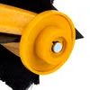 A close-up view of a yellow brush attachment with black bristles and a silver metal pin. Podgląd zdjęcia produktu