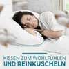 A woman sleeping peacefully on a pillow in bed. Produktbild-Vorschau