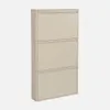 A cream-colored metal shoe cabinet with three drawers. Produktbild-Vorschau