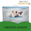 A product packaged in a clear plastic bag with a family photo on the front. Produktbild-Vorschau