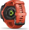 The back of an orange Garmin Instinct Solar watch with green heart rate sensors illuminated. Produktbild-Vorschau
