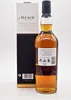 A bottle of The Ileach Islay Single Malt Scotch Whisky and its packaging. Produktbild-Vorschau