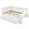A white daybed with drawers and storage compartments, shown from a three-quarter angle. Náhled obrázku produktu