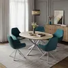 A dining room scene featuring an oval dining table with chairs. Anteprima dell’immagine prodotto