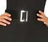 Close-up of a black dress with a silver buckle belt, with hands on the hips. Produktbild-Vorschau