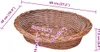 A wicker basket with dimensions indicated by measurement lines and text. Voir les images du produit