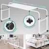 A collage of images showing a white overbed table with wheels, its features, and in use in different settings. Anteprima dell’immagine prodotto