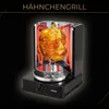 A rotisserie grill with a chicken cooking on it, set against a dark background with text at the top. Náhled obrázku produktu