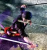A dynamic action scene of a character wielding swords. Náhled obrázku produktu
