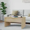 A coffee table in a living room setting with a sofa and a plant. Náhled obrázku produktu