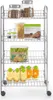 A silver metal rolling cart filled with various food items and containers. Produktbild-Vorschau