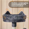 A close-up of a dark gray cat tree with cat ear-shaped platform, against a light brown and white wood-paneled background. Produktbild-Vorschau