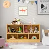 A children's playroom with a wooden toy shelf filled with toys, books, and decorations. Produktbild-Vorschau