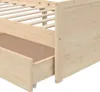 Close-up view of a wooden bed frame with an open drawer. Produktbild-Vorschau