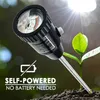 A soil moisture meter is shown inserted into the soil next to a small plant, with bright sunlight in the background. Produktbild-Vorschau