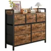 A dresser with drawers and decorative items on top. Náhled obrázku produktu