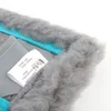 A close-up view of a cleaning cloth with a label. Produktbild-Vorschau