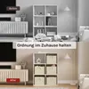 A split image showing a 'before' and 'after' of a living room storage area, demonstrating organization. Produktbild-Vorschau