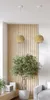 A modern living room with two pendant lights and a potted plant. Produktbild-Vorschau