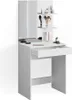 A white vanity table with a mirror and shelves, displaying makeup. Podgląd zdjęcia produktu