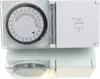 A white 24-hour timer switch with a clear protective cover showing the dial and settings. Produktbild-Vorschau