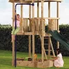 Children playing on a wooden playground with a slide and sandbox. Anteprima dell’immagine prodotto