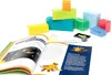 An open book with colorful illustrations and text, surrounded by colorful blocks and a compass, on a white background. Náhled obrázku produktu