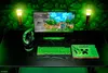 A gaming setup with a Minecraft theme, featuring a monitor, keyboard, mouse, mousepad, and headphones. Podgląd zdjęcia produktu