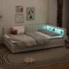 A bedroom scene with a bed, pillows, blankets, and wall art. Podgląd zdjęcia produktu