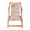 A pink deck chair with a cartoon dog print. Náhled obrázku produktu