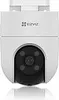 A white security camera with a black lens and four infrared lights is shown against a white background. Produktbild-Vorschau