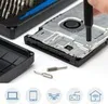 A hand is using a screwdriver to repair a device, with a set of precision bits and a case in the background. Icons representing various electronic devices are at the bottom. Náhľad obrázku produktu