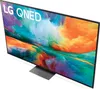 A television set with a colorful abstract image displayed on its screen, placed on a stand. Produktbild-Vorschau