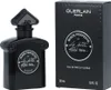 A black perfume bottle and its matching black box are displayed side-by-side against a white background. Podgląd zdjęcia produktu