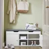A hallway or entryway with a shoe bench, coat, and bags. Produktbild-Vorschau