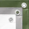 Close-up view of layered tarpaulins in green, gray, and white, showing grommets. Náhľad obrázku produktu