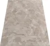 A beige shaggy rug with a textured pattern, presented on a white background. Anteprima dell’immagine prodotto