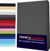 Dark gray jersey fitted sheet next to a stack of fabric swatches in various colors Anteprima dell’immagine prodotto