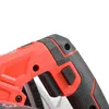 A close-up view of the handle and part of the body of a red and black power tool, likely a circular saw. Produktbild-Vorschau