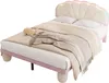 A bed with a shell-shaped headboard and LED lights, made of beige velvet and pink accents. Podgląd zdjęcia produktu
