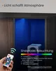 A hand holding a remote control points towards a speaker with adjustable lighting. Produktbild-Vorschau