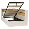 A white upholstered bed frame with its mattress support mechanism lifted, revealing storage space underneath. The headboard has built-in shelves and LED lighting. Náhled obrázku produktu