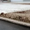 Close-up view of the edge of a rug with a checkered pattern. Anteprima dell’immagine prodotto