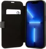 A black BMW branded flip case for an iPhone 14 Pro is shown open, with the phone displaying a blue wallpaper. Produktbild-Vorschau