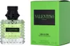 A bottle of Valentino Donna Born In Roma Green Stravaganza Eau de Parfum and its packaging are displayed side-by-side against a white background. Anteprima dell’immagine prodotto
